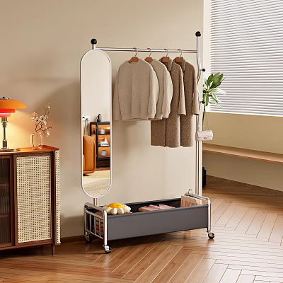 Rolling Clothes Rack With Mirror And Storage Basket Hanging Sweaters In Living Room 3d model