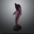 Vibrant Colored Dolphin Sculpture Standing In Upright Pose On Black Stone Base