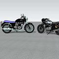 Two Vintage Motorcycles Against Blue Sky With White Clouds On Reflective Ground