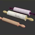 Three Different Rolling Pins With Wooden Marble Pattern Bodies And Black Handles For Baking