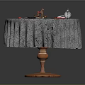 Round Table Scene With Patterned Tablecloth And Colorful Toys Books Stationery