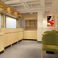 Modern Restaurant Interior With Green Chairs Light Tables White Walls And Artwork