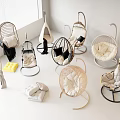 Stylish Rattan Hanging Chairs with Soft Cushions in Various Modern Neutral Designs