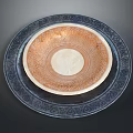Stacked Ceramic Plates With Blue Outer Orange Inner Plant Patterned Designs 3d model