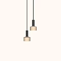 Two Modern Pendant Lights With Beige Shades And Black Metal Frames For Interior Decor