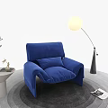 Comfortable Blue Single Sofa With Round Globe Floor Lamp Small Side Table And Gray Circular Rug 3d model