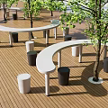 Outdoor Rest Area With Wooden Deck Curved Benches And Green Trees