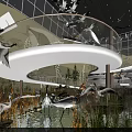 Modern Cultural Center Interior With Curved Walkway Crane Sculptures Water Features And Greenery