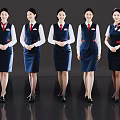 Women In Smart Blue Flight Attendant Uniforms Standing In A Row