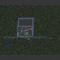 Industrial Plant Site With Multiple Buildings Equipment Parking Lot And Surrounding Trees