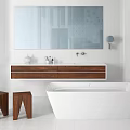 Modern White Bathtub In Minimalist Bathroom With Wooden Vanity Large Mirror And Small Stools