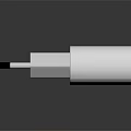 White Laptop Charger With Dual Pin Design And Black Background Reflection