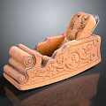 Traditional Terracotta Carved Rocking Chair With Intricate Scroll Patterns And Decorative Motifs