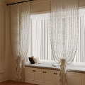 Elegant White Lace Curtains With Window Bench Pillows And Books In Room