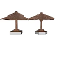 Two Outdoor Thatched Roof Pavilions With Wooden Pillars And Square Bases