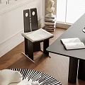 Modern Dining Chair With Black Frame And White Cushion In Wooden Floor Interior With Table
