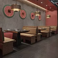 Cozy Sichuan Hot Pot Restaurant Interior With Comfortable Booth Seats And Artistic Wall Decorations