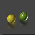 Two Fresh Yellow and Green Round Fruits Displayed on Blue Background