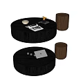 Modern Round Black Wooden Coffee Table With Open Magazine And Decorative Candle Holder
