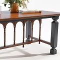 Wooden Dining Table With Arched Black Legs And Decorative Vase Flower Bouquet