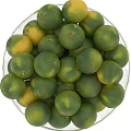 Fresh Juicy Green Limes Displayed in Transparent Glass Bowl on White Background