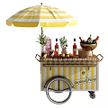 Yellow And White Striped Bar Cart With Umbrella For Cocktail Party Drinks Glasses And Fruits