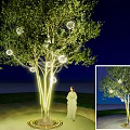Illuminated Tree At Night Decorated With Glowing Spheres And Person Standing Under Circular Lit Ground