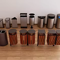 Various Modern Trash Bins With Different Designs And Materials On Wooden Floor