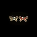 Decorative Blue And Pink Butterfly Wall Lamps With Soft Glow On Gray Wall