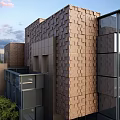 Modern Townhouse Exterior Design Featuring Glass Elements Geometric Structure And Greenery