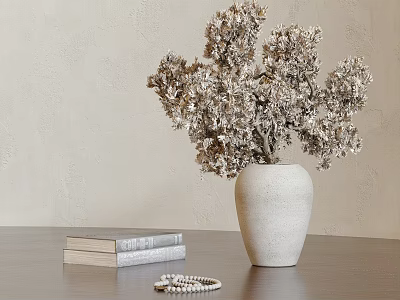 White Ceramic Vase With Dried Flowers On Table Near Stack Of Books And Beaded Bracelet 3d model