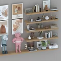 Decorative Ornament Combination Featuring Wall Art Prints Colorful Figurines With Books Vases Plants On Shelves