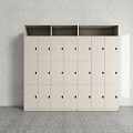 Modern White Wardrobe With Multiple Doors And Metal Handles In Gray Interior