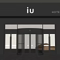 iu Hotel Main Entrance Featuring Revolving Door Gray Building Glass Design Modern Style