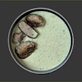 Ceramic Bowl With Green Soup Placed On Woven Mat As Daily Kitchen Utensil