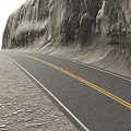 Winding Road Along Massive Rocky Cliff Featuring Double Yellow Lines And Gravel Ground