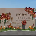 Elegant Floral Display for Welcome Event with Red Orange Blooms Greenery and Backdrop