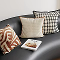 Stylish Decorative Pillows With Various Patterns On Black Sofa And Home Magazine