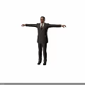 Man in Double Breasted Suit Standing with Arms Outstretched Against Gray Background