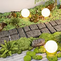 Natural Garden Landscape Design With Stone Pathway Luminous Round Lights Green Plants And Mossy Rocks