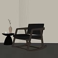 Comfortable Black Rocking Chair with Leather Seat Wooden Frame and Side Table by Light Wall