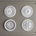 Four Classic Decorative Ceiling Medallions With Ornate Patterns On Gray Panel 3d model
