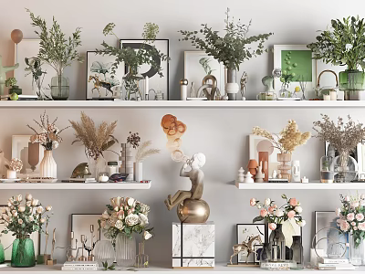 Stylish Decorative Ornaments Set With Green Plants Vases Photo Frames And Sculptures On Shelves 3d model