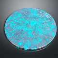 Ornate Round Blue Illuminated Jewelry Piece With Intricate Pattern Design