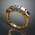Luxurious Gold Ring Featuring Sparkling Blue Gemstones And Intricate Band Design