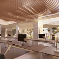 Bright Modern Public Office Space Featuring Desks Computers Natural Light And Wooden Ceiling