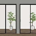 Modern Glass Sliding Doors With Black Frame In Indoor Space And Green Plant