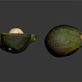 Fresh Ripe Avocados Whole and Halved with Green Flesh and Pit
