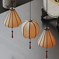 Chinese Style Pendant Lights With Beige Lampshades Black Frames Red Tassels And Dark Tabletop