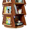 Tree Shaped Wooden Bookshelves With Various Books And Small Decorative Ornaments